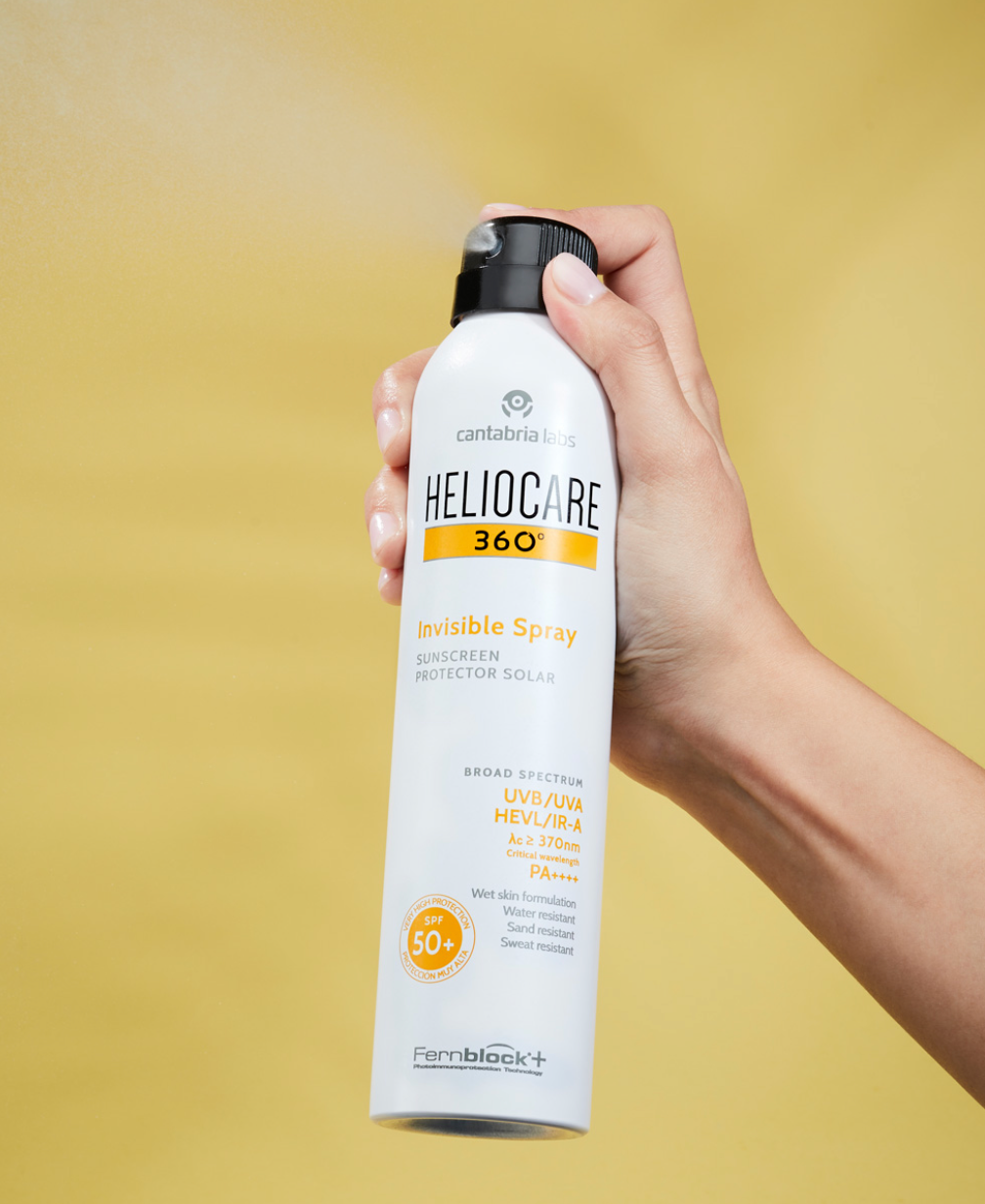 HELIOCARE INVISIBLE SPRAY SPF 50+ - Aurinkosuoja vartalolle