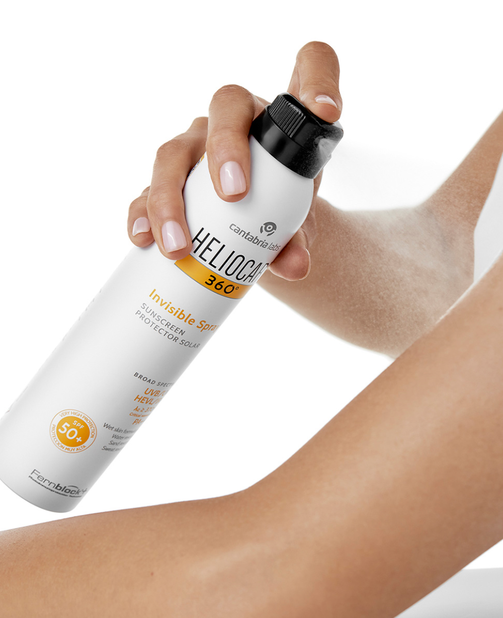 HELIOCARE INVISIBLE SPRAY SPF 50+ - Aurinkosuoja vartalolle