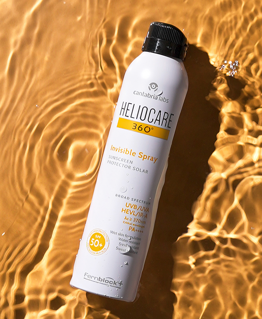 HELIOCARE INVISIBLE SPRAY SPF 50+ - Aurinkosuoja vartalolle
